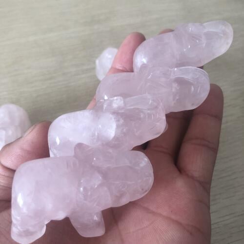 Beautiful natural pink crystal hand-carved baby elephant as a gift and decorated home