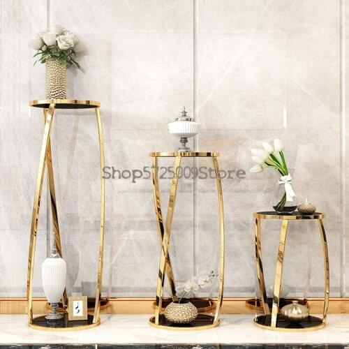 Postmodern stainless steel flower stand round shelf indoor balcony shelf light luxury living room modern minimalist flower table