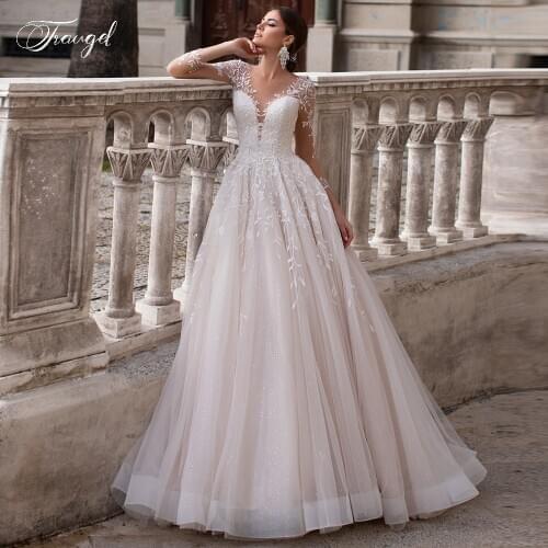 Traugel O Neck A Line Lace Wedding Dresses Elegant Shiny Long Sleeve Bridal Dress Court Train Wedding Gowns for Bride Plus Size