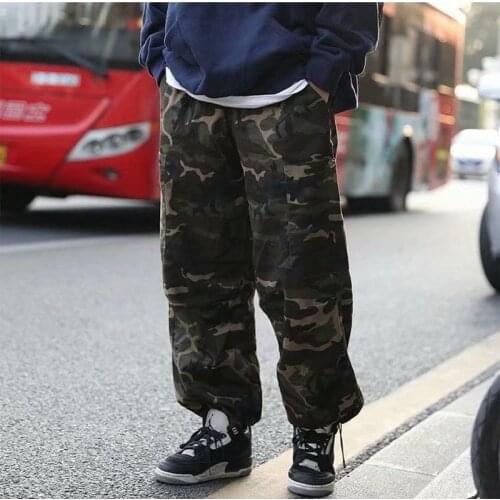 Europe and the United States high street hiphop hip hop loose camouflage shorts men and women hip hop overalls