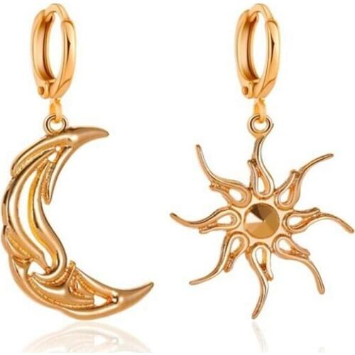Simplicity Hollow Out Sun And Moon Clip Earrings European And American Womens Asymmetric Earrings Creative Jewelry