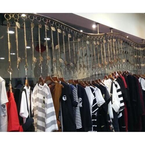 Clothing store display stand. On the wall side rack. Retro combination racks. Hanging.009