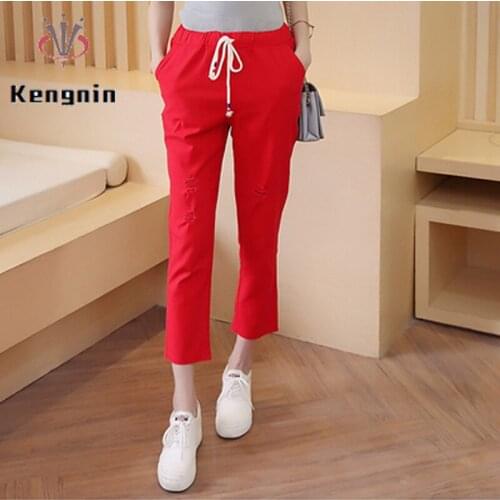 Summer 2021 Women Trousers Casual Anklet-Length Pants Lady Elastic Waist Drawstring Harem Pants Oversize Hole Capris KE1580