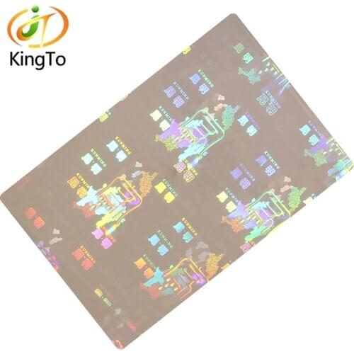 Hot embossed hologram laminating pouches with fluorescent ink printing