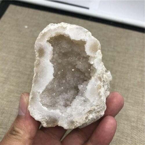 Natural agate geode crystal hole Mineral specimen contains clean crystal clusters of very beautiful small stones and crystals