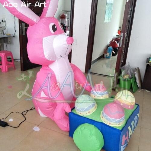 Inflatable Easter Colorful Decoration "Pink rabbit is pushing a cart full of eggs" Inflatable Model Decoration for Advertisement