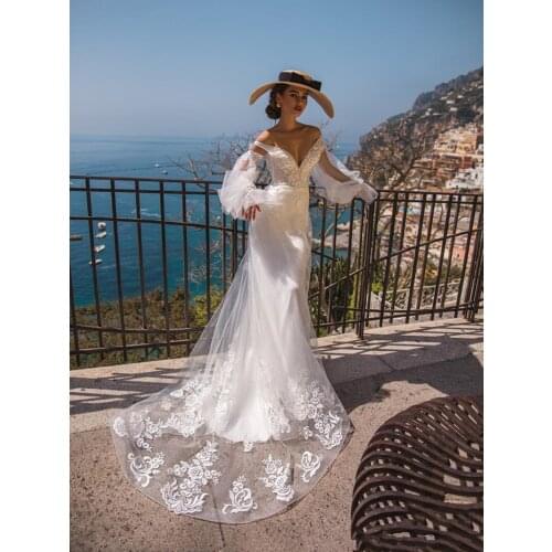 Elegant Mermaid Wedding Dresses Backless Deep V-Neck Embroidery Applique Bridal Gowns Long Lantern Sleeve Lace Train Plus Size