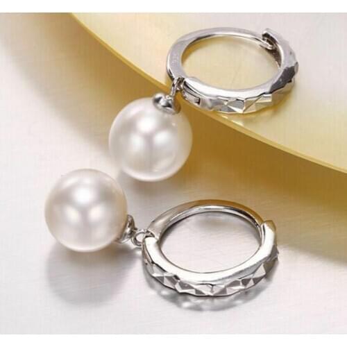 A pair of AAA10-11mm round south sea whiter pearl dangle earring 925silver