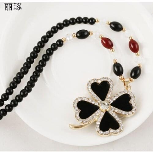 Korean fashion lucky four-leaf clover pendant long necklace female inlaid crystal zircon pendant with beaded necklace