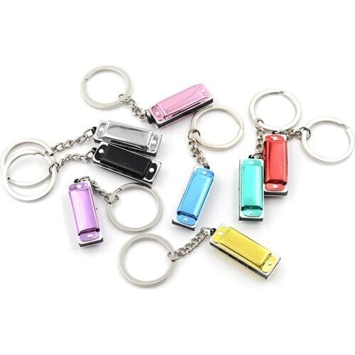 1PC Mini Car Key Ring 4 Holes 8 Tone Harmonica Keychain Kid Harmonica Toy Gift 3.6 * 1.2 * 0.8cm