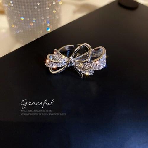 Korean fashion jewelry personality zircon bow open ring temperament design sense of hand ornaments for women wholesale
