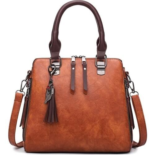 New style handbags, large capacity PU handbags, European and American ladies tassels, one shoulder messenger bag, wild retro