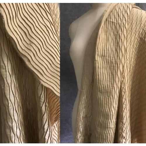 Shimmer light yellow wave pleated champagne color curved pleated garment fabric
