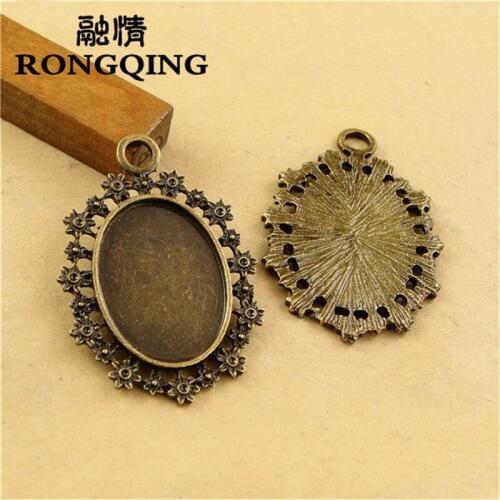 RONGQING 30pcs/lot Oval Cabochon Settings 25*18MM Hollow Flower Frame Cameo Pendant Blanks DIY Accessories