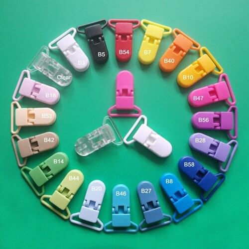Free Shipping SUTOYUEN 100 pcs Plastic Clip Plastic Suspender Clips Dummy Bib Soother Clip Toy Pacifier Clip Holder For Baby