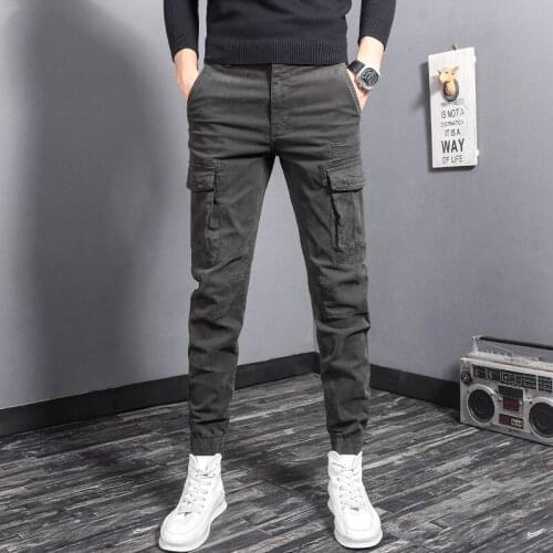 Newly Fashion Designer Men Jeans Patched Big Pocket Casual Cargo Pants Streetwear Hip Hop Jogger Jeans Men Ankle Banded Trousers