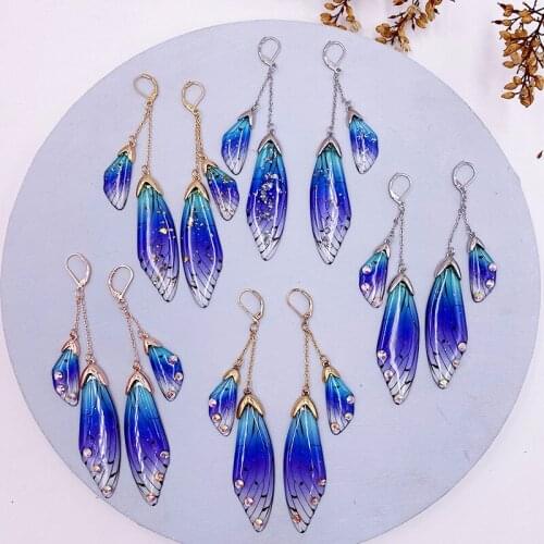 MINAR Blue Color Clear Resin Butterfly Earrings 2021 Shiny Rhinestone Glitter Simulation Wing Drop Earrings Wedding Jewelry