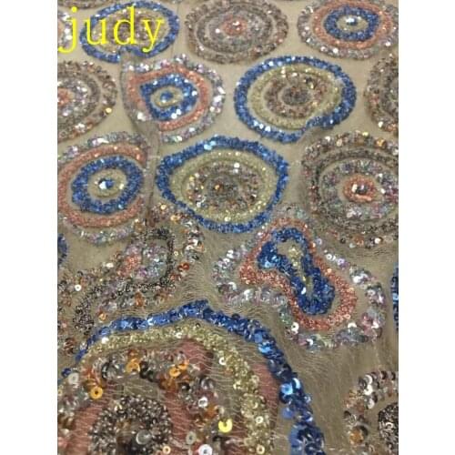 Stock5yards/bag HD01# The multi-colored sequins in the circle fabric are used for wedding dress party stage dresses November new