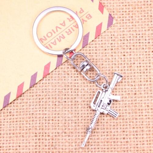 New Fashion Keychain 45x16mm machine gun assault rifle Pendants DIY Men Jewelry Car Key Chain Souvenir For Gift