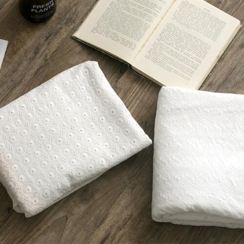 High quality cotton fabric White hollow embroidery tissu Wedding dress, skirt dress, baby clothes and handicraft material