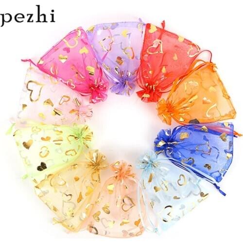 100PCS Bronzing peach heart-shaped pattern bunch yarn bag pearl mesh bag hand jewelry cosmetics sample bag