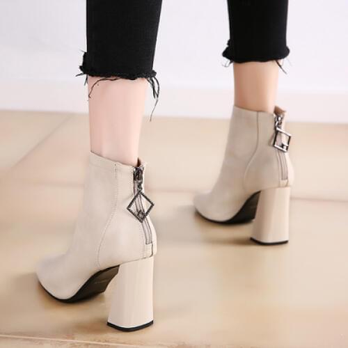 Martins 2019 vintage cube-toe ankle boots are paired with skinny boots and winter heels