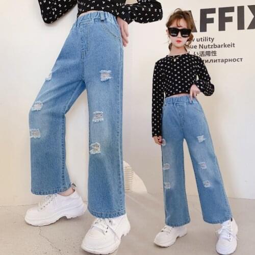 Girls jeans new spring dress in the air of the big childrens hole-in-the-hole trousers spring and autumn girls pants