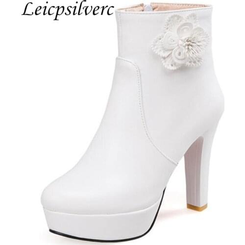 New autumn and winter rough heel female boots round head flower waterproof platform high heel boots