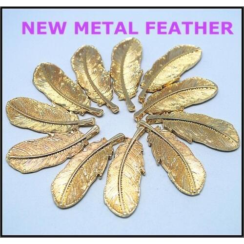 New arrivals10 pcs charms new golden plated metal pendants alloy pendants feather shapes size 36x13mm golden silver colors
