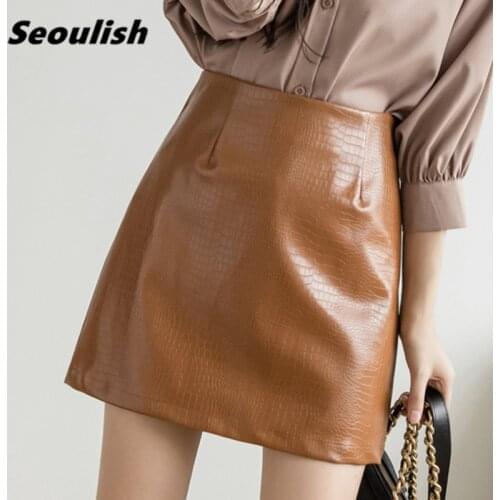 Seoulish Autumn Winter Womens PU Leather Skirts 2021 New Solid Sexy Mini Skirts High Waist Wrap Short A-Line Skirts Female