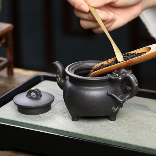 ★Purple clay teapot Li Haiyans three legged teapot pure handmade