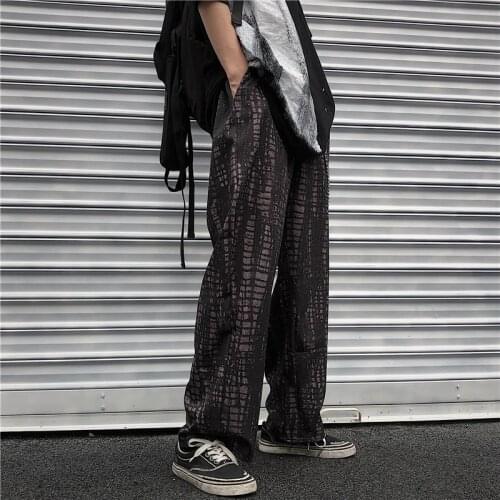 Harajuku ins trend mens and womens casual pants straight loose retro old leather pattern wide-leg pants with chain