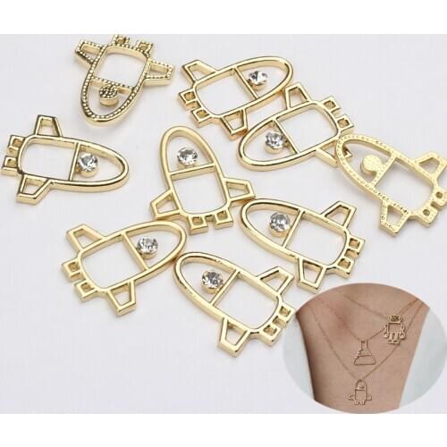 6pcs/lot Zinc Alloy Golden Rocket Airplane Charms Hollow Border For DIY Fashion Pendant Earrings Jewelry Making Accessories
