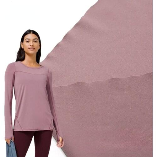 Cool Milk Silk Knitted Fabric By The Yards Swimwear Four-way Stretch Polyester Fiber for Sewing Sports Yoga Wear And Gym Clothes