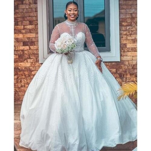 2021 Luxury African Ball Gown Wedding Dresses Major Beading Beads Long Sleeve High Neck Crystals Belt Wedding Dress Bridal Gowns