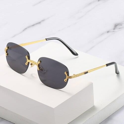 New sunglasses fashion rimless square sunglasses women retro metal color film sunglasses men personality street driving glasses