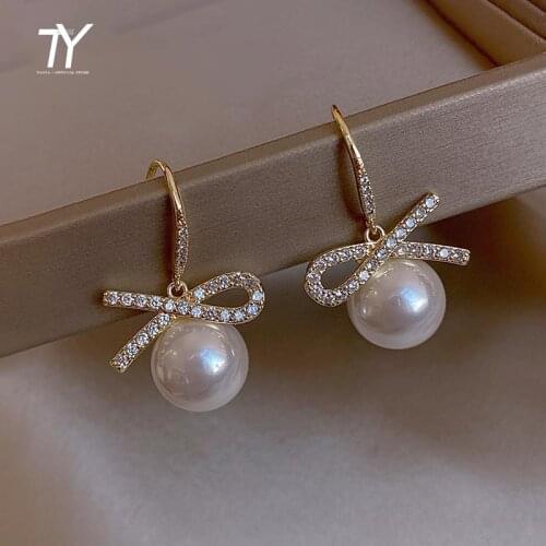 Luxury Micro Inlaid Zircon Bowknot White Pearl Drop Earrings For Woman Korean Fashion Jewelry Wedding Girls Elegant Earrings