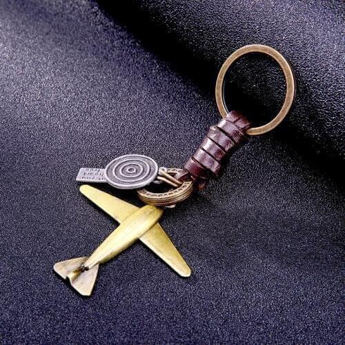 Fashion aircraft shaped trinket men keychain key chains locksmith Hand weaving cowhide bronze rucksack buckle car ring gifts