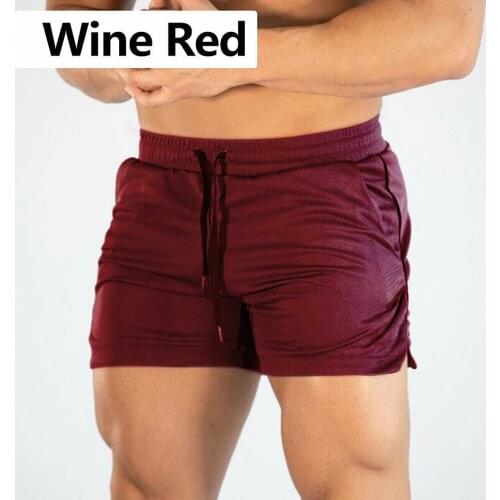 Summer Gyms Workout Male Breathable Mesh Quick Dry Sportswear Jogger Beach Solid Shorts Men Fitness Bodybuilding Shorts