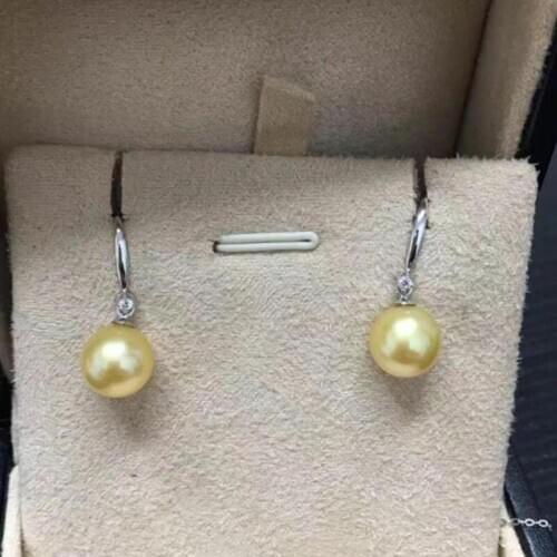 Charming round 10-11mm south sea gold pearl earring 925s