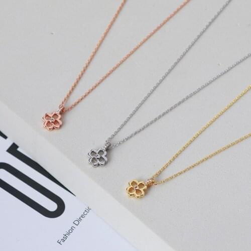 European and American style simple designer hollow lucky grass shape necklace clavicle chain smooth female small fresh gift