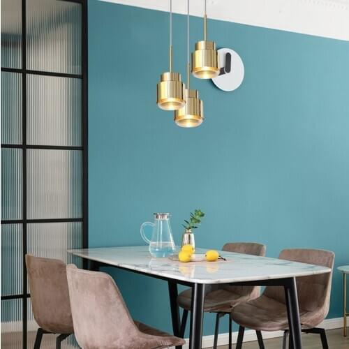 Simple modern personalized creative designer hotel bedside model room cafe glass LED single head small chandelier