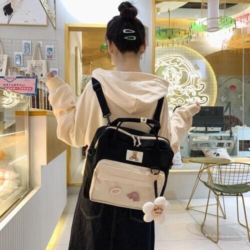 Multi-Functional Women Backpack Useful Preppy Style Shoulder Bag Contrast Color Backpack Flower Pendant for Teenage Girls Bag