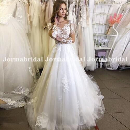 Long Sleeves Bohemian Wedding Dresses Sheer O-Neck Glitter Tulle Beach Bridal Gowns Brilliant Transparent Buttons Sparkly Dress