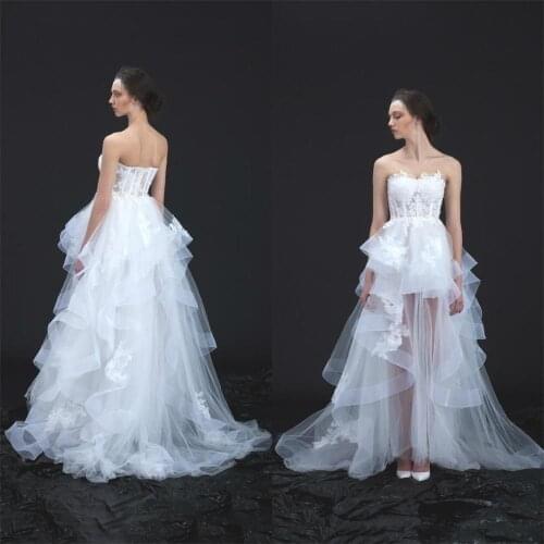 2020 New Designer A Line Wedding Dresses Lace Applique Strapless Beach Wedding Gowns Beaded Bridal Gown Ruffles Custom Made