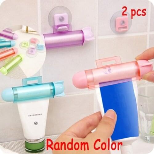 2Pcs Abs Cute Rolling Squeezer Toothpaste Dispenser Tube Partner Hanging Holder