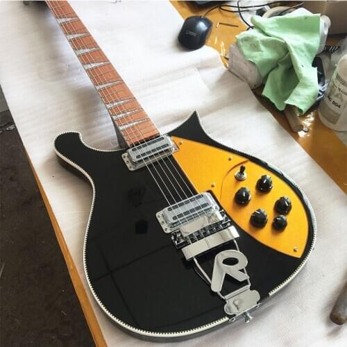 High quality black full-bodied 660 electric guitar, mahogany fingerboard with varnish gloss, head 5 degrees, neck through the bo