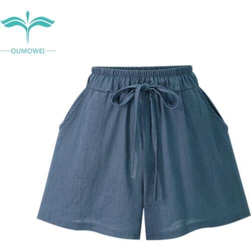 Oumowei High Waist Shorts Women Smocked Belted Beach Summer Shorts Plus Size Loose Elastic Waist Streetwear Wide Leg Shorts 5XL