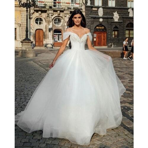 Boho Bridal Gown 2021 new Sexy Boat Neck backless Bride Wedding Dress Luxury Crystal and Pearls Vestido de novia Robe de mariee