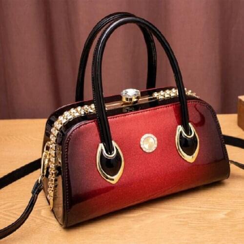 New womens bag fashion leather portable large capacity cross slung patent leather Boston clip